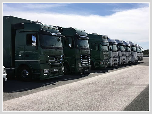 Covered car transport to a track day in Spain.